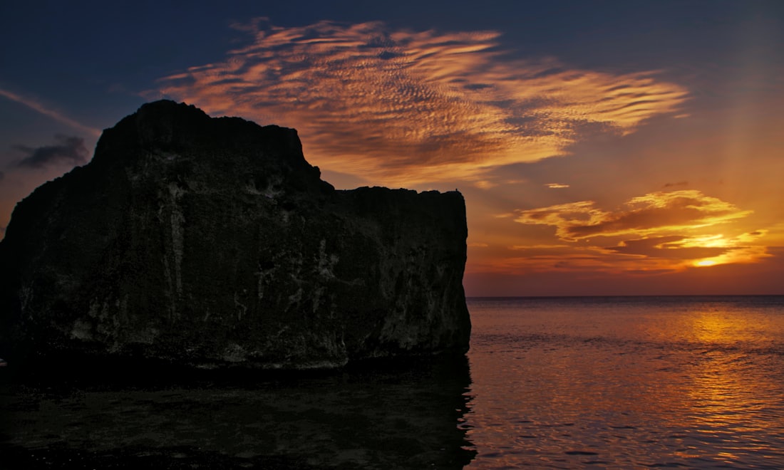 A sea arch glowing at sunset — Barahona & the Southwest, Dominican Republic